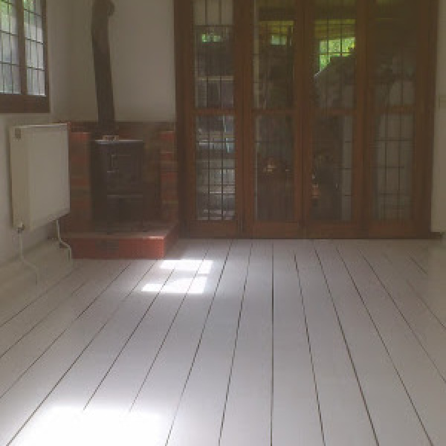 Floor sanded, gaps filled, floor painted and room decorated